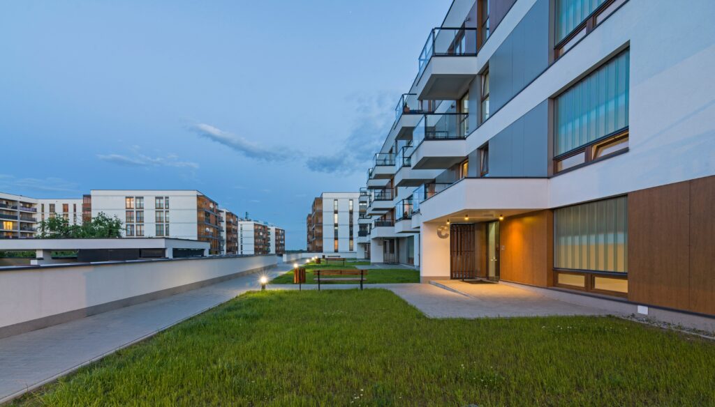 A,Modern,Multifamily,Building,In,A,European,City,At,Night